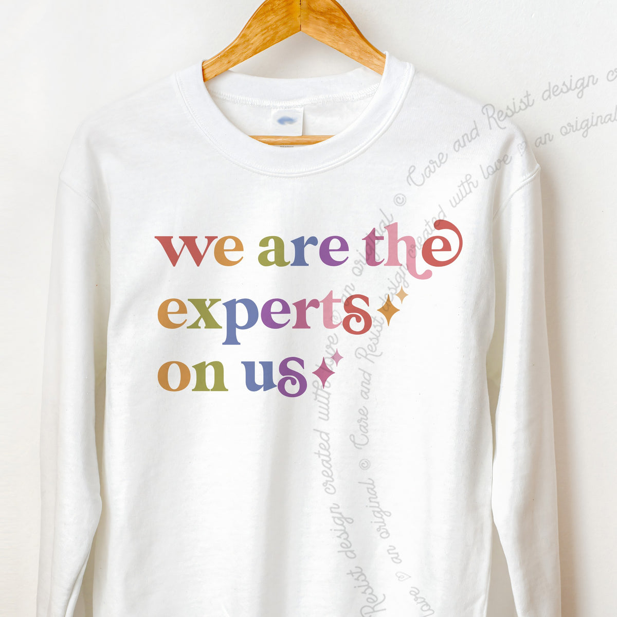 We are the Experts on Us Care & Resist Gildan crewneck sweatshirt in White