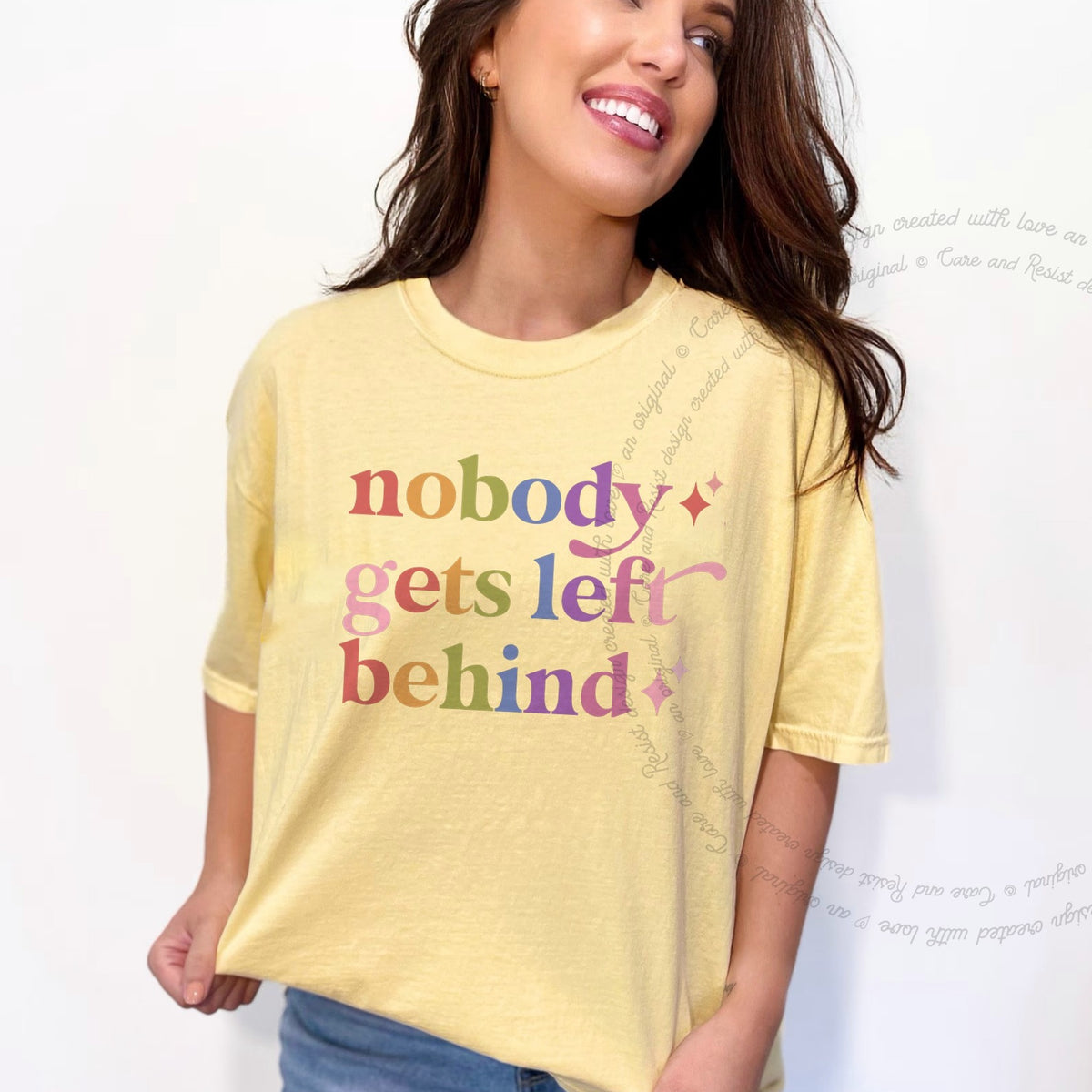 Nobody Gets Left Behind Care & Resist rainbow tee