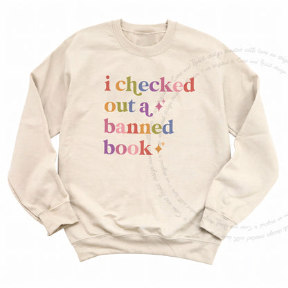 I Checked Out a Banned Book Care & Resist Gildan crewneck sweatshirt in Sand