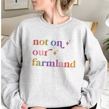 Not on Our Farmland Care & Resist Gildan crewneck sweatshirt in Sport Grey