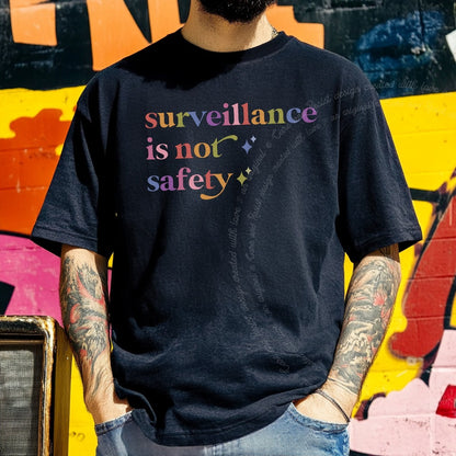 Surveillance is not Safety Care & Resist rainbow Comfort Colors tee, Black