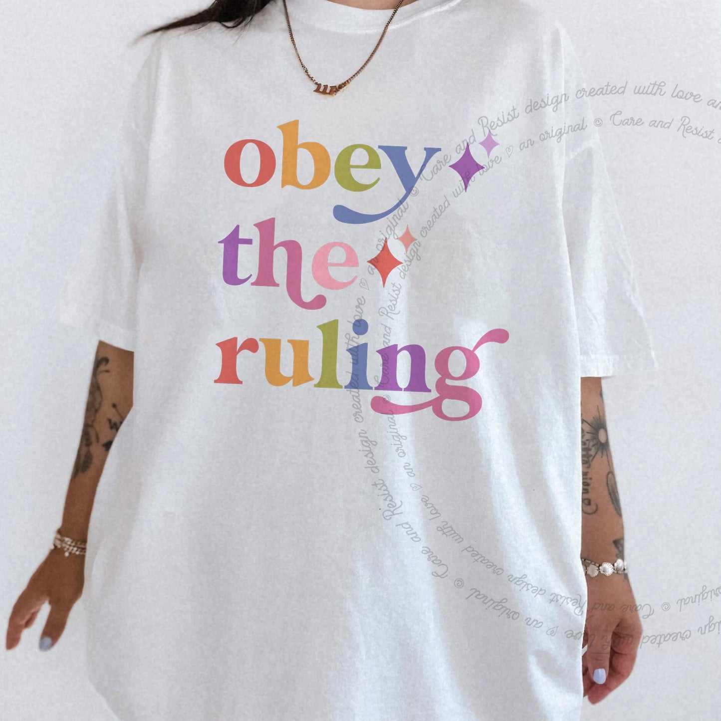 Obey the Ruling Care & Resist rainbow tee