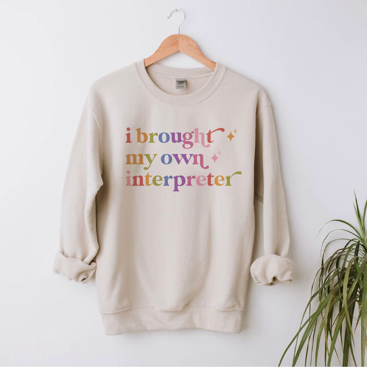 I Brought My Own Interpreter Care & Resist Gildan crewneck sweatshirt in Sand