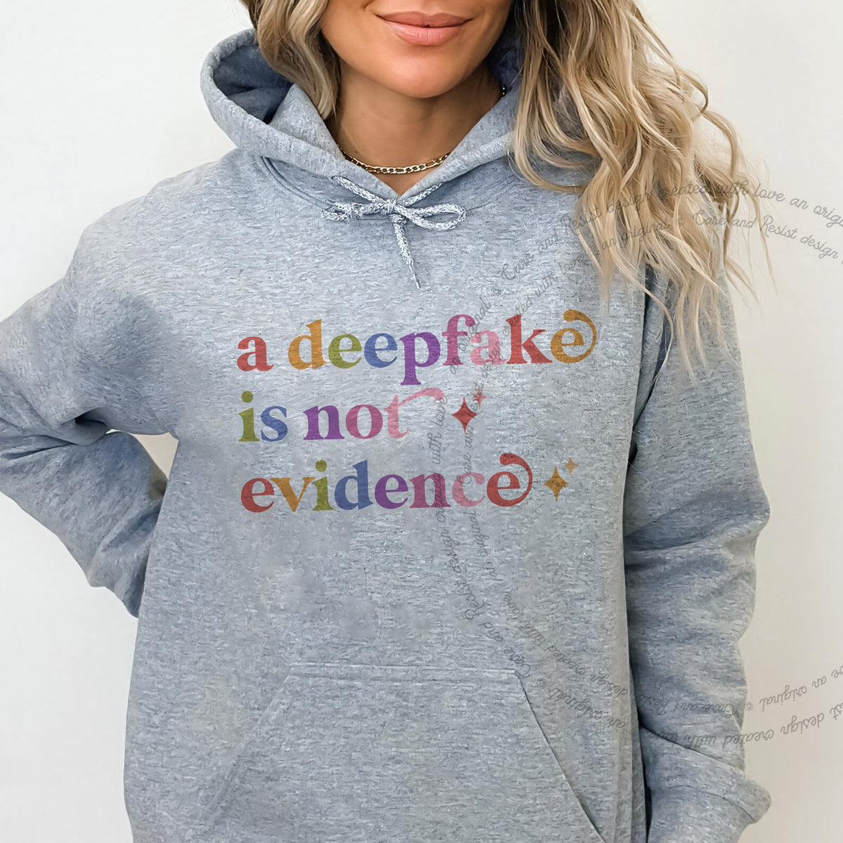 A Deepfake is not Evidence Care & Resist Gildan hoodie in Sport Grey