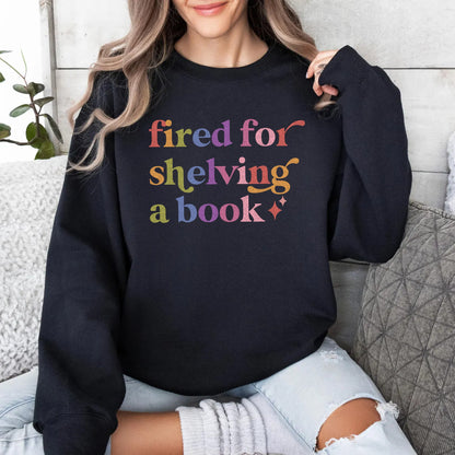 Fired for Shelving a Book Care & Resist Gildan crewneck sweatshirt in Black