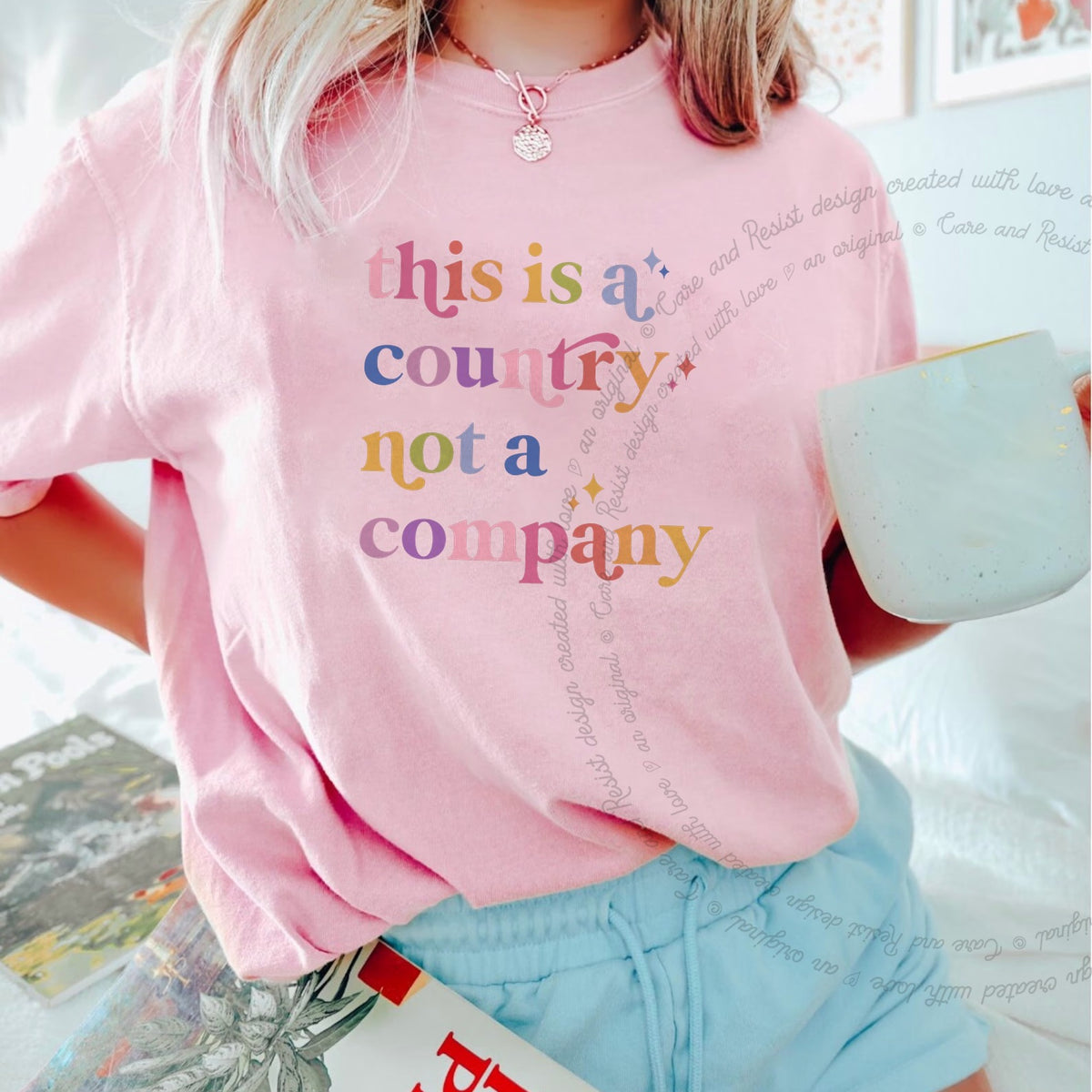 This Is a Country Not a Company Care & Resist progressive t-shirt in Blossom