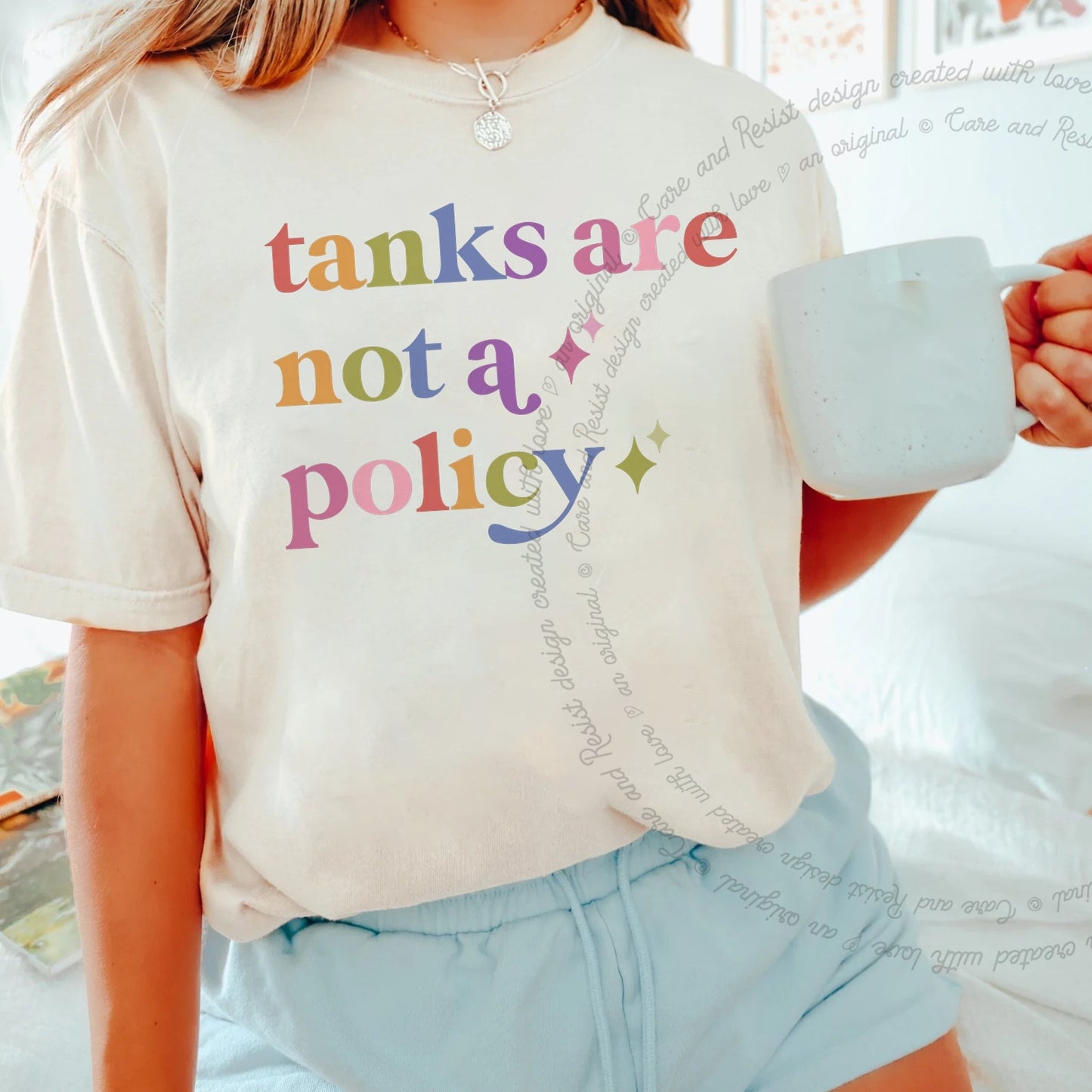 Tanks are not a Policy Care & Resist rainbow tee