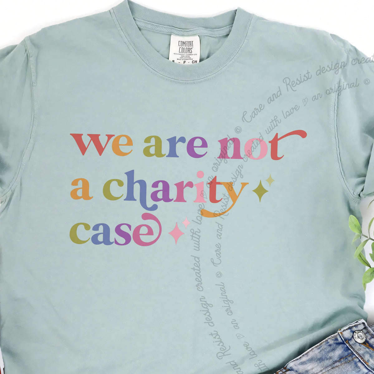 We are not a Charity Case Care & Resist progressive t-shirt in Bay