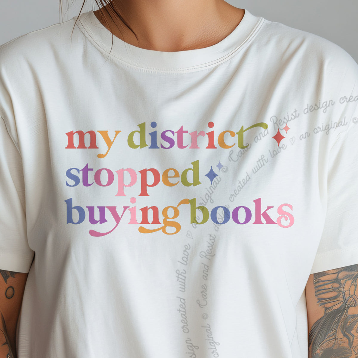 My District Stopped Buying Books Care & Resist progressive t-shirt in Ivory