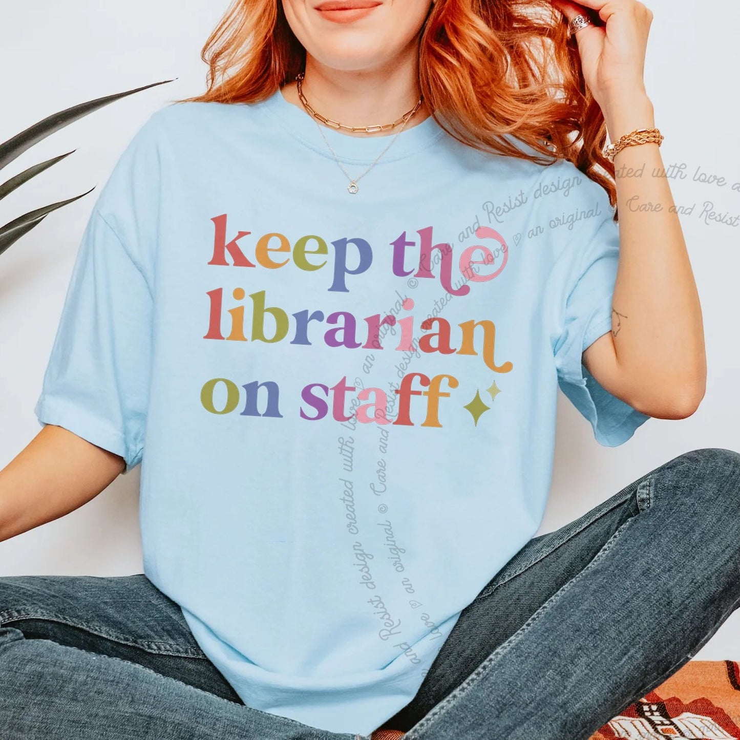 Keep the Librarian on Staff Care & Resist rainbow tee