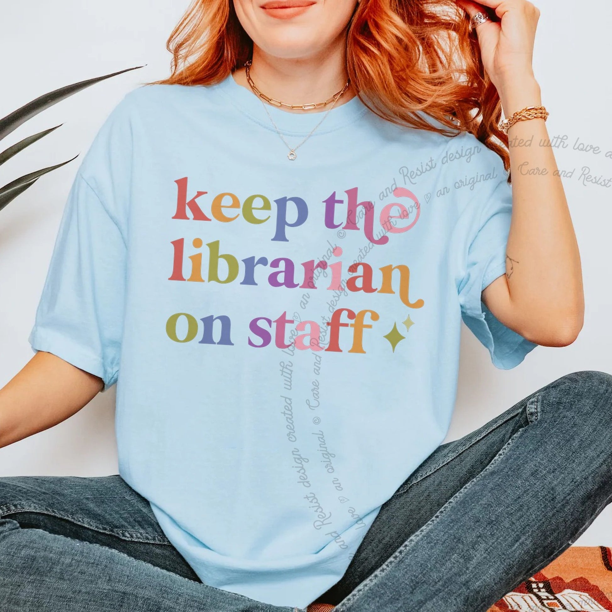 Keep the Librarian on Staff Care & Resist rainbow tee