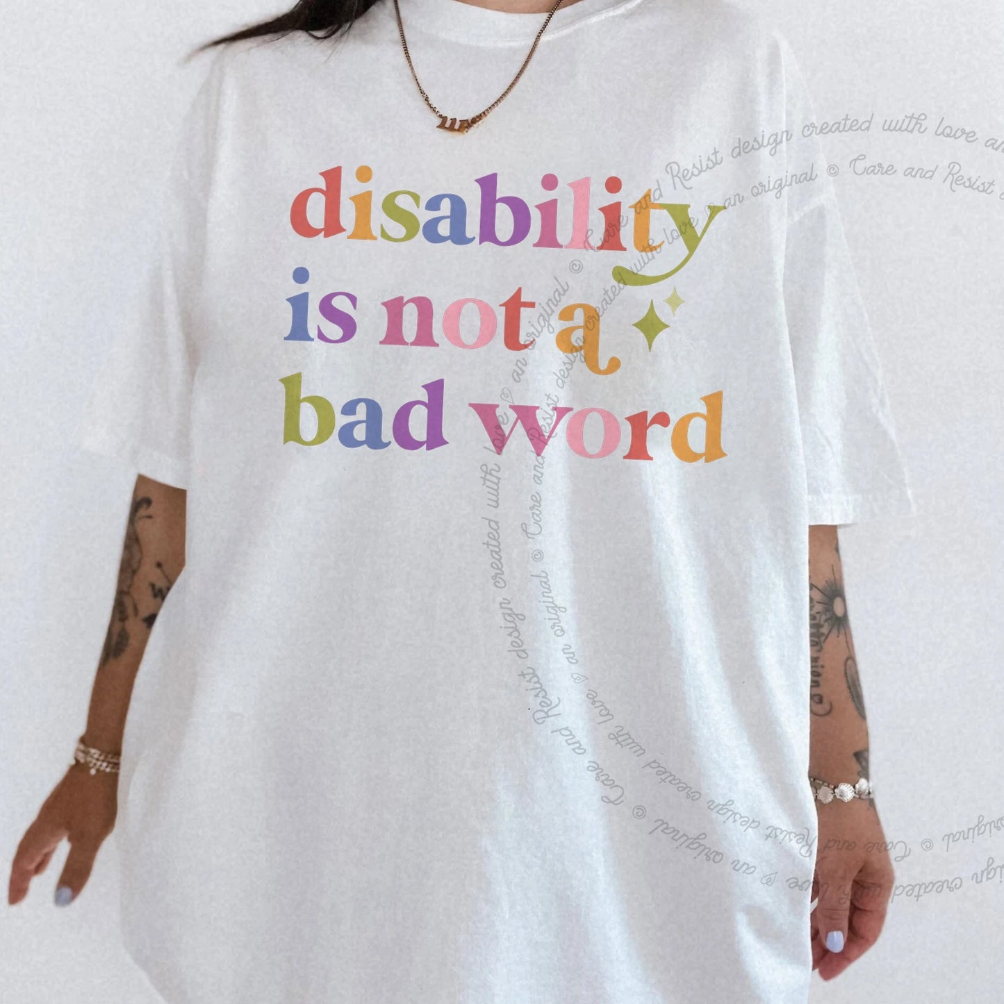 Disability is not a Bad Word Care & Resist rainbow Comfort Colors tee, White