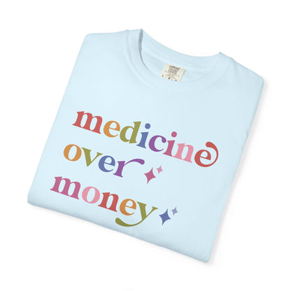 Medicine Over Money Care & Resist rainbow Comfort Colors tee