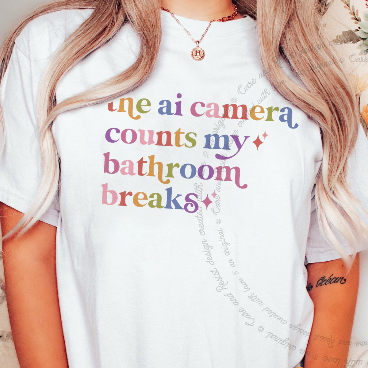 The Ai Camera Counts My Bathroom Breaks Care & Resist tee in White