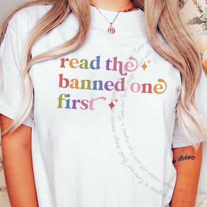 Read the Banned One First Care & Resist rainbow tee