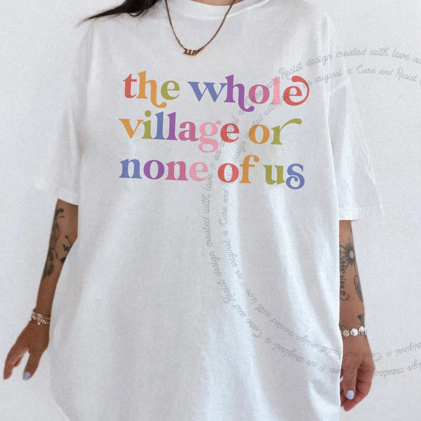 The Whole Village or None of Us Care & Resist rainbow Comfort Colors tee, White