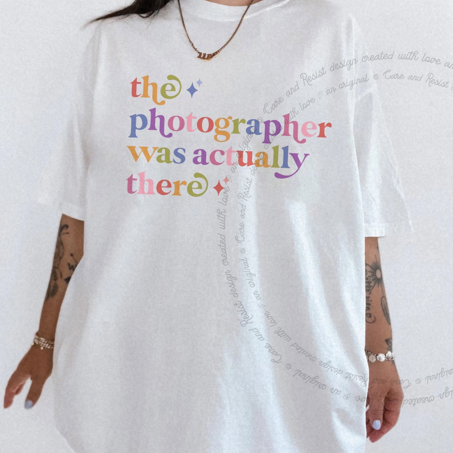 The Photographer Was Actually There Care & Resist rainbow tee