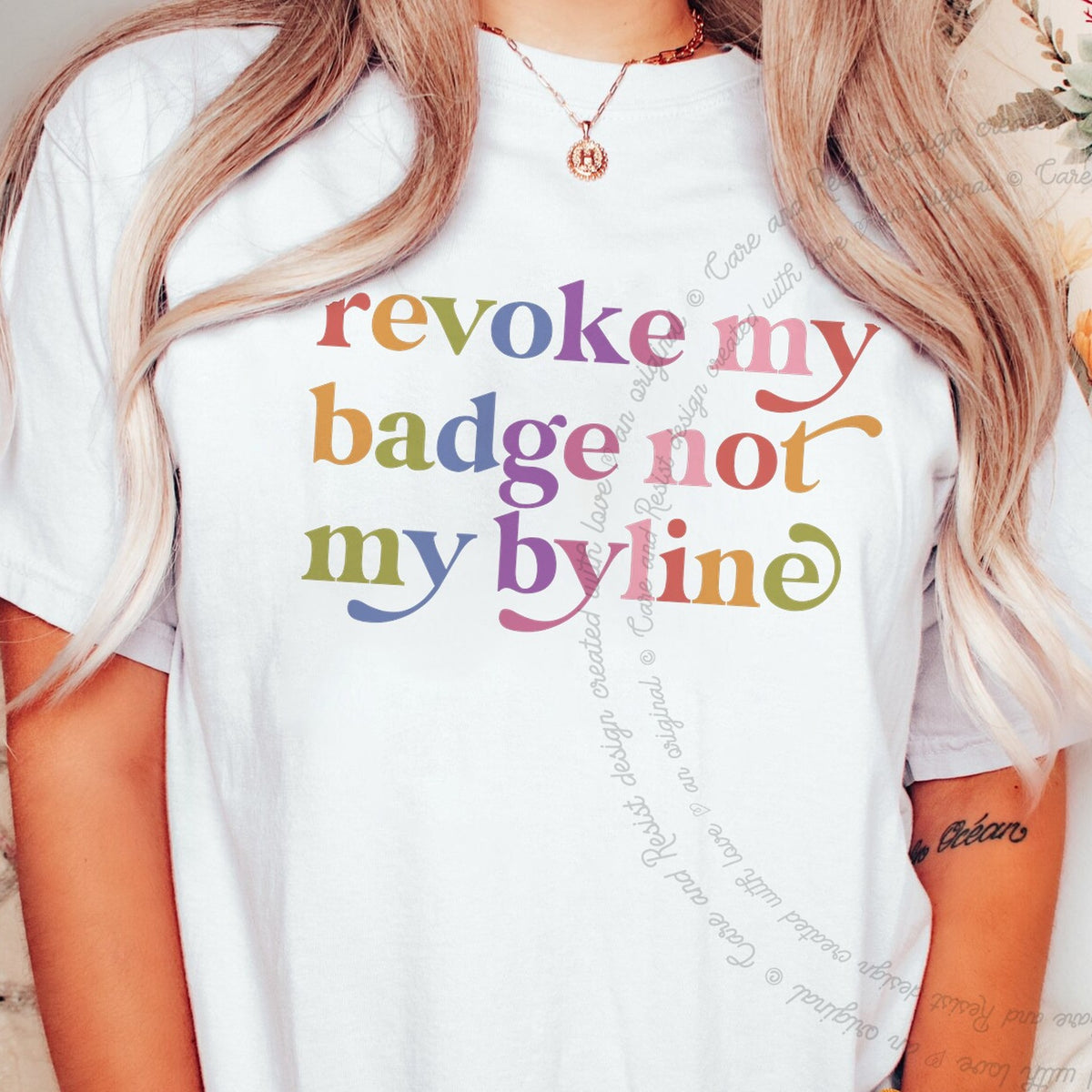 Revoke My Badge not My Byline Care & Resist progressive t-shirt in White