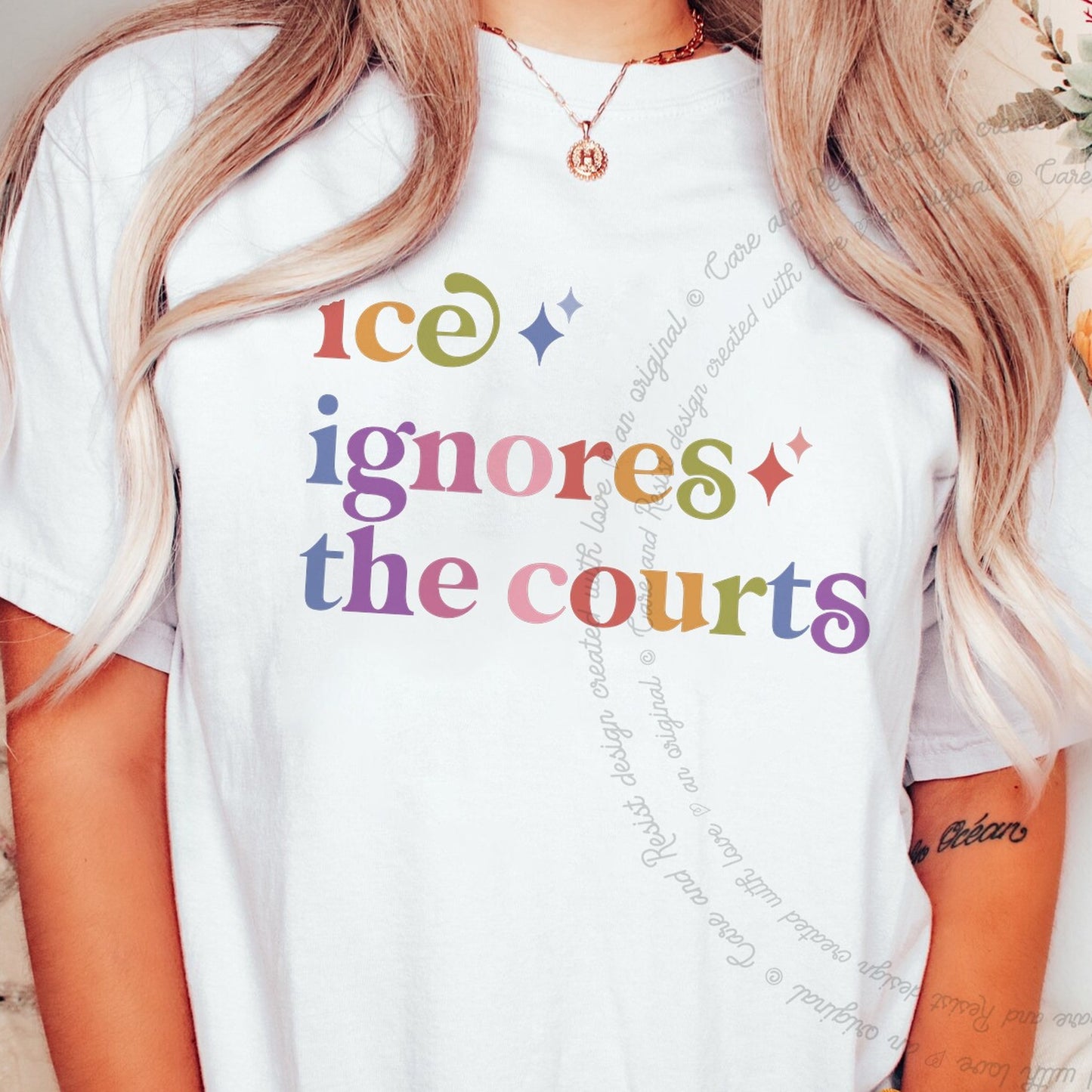 Ice Ignores the Courts Care & Resist rainbow tee