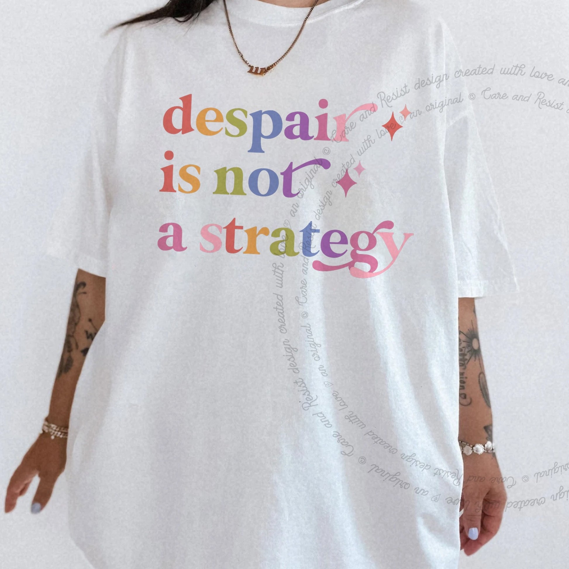 Despair is not a Strategy Care & Resist rainbow Comfort Colors tee, White