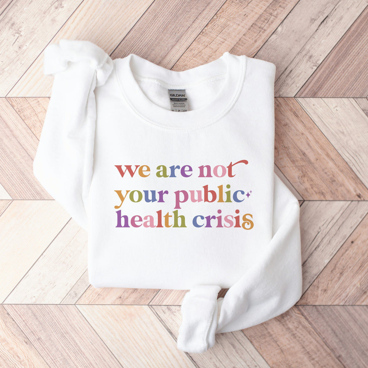 We are not Your Public Health Crisis Care & Resist Gildan crewneck sweatshirt in White