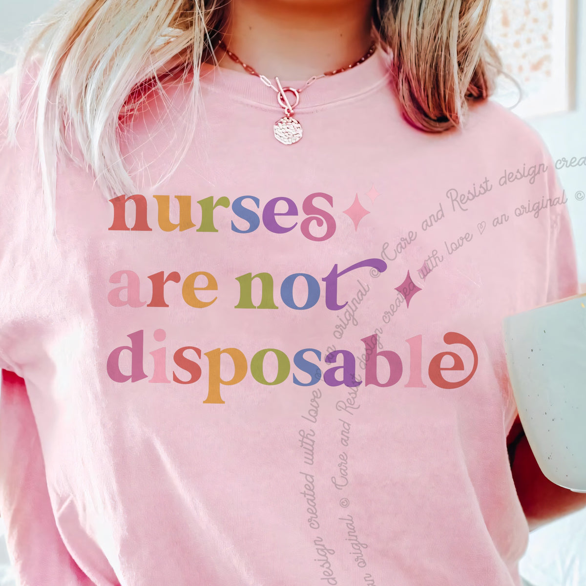Nurses are not Disposable Care & Resist progressive t-shirt in Blossom