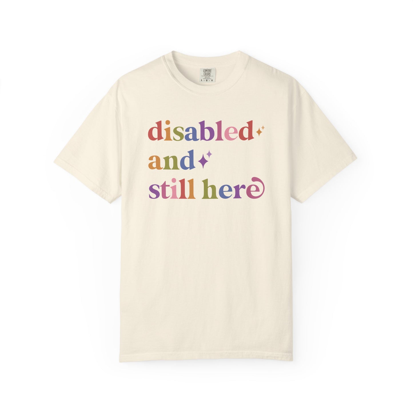 Disabled and Still Here Care & Resist rainbow Comfort Colors tee