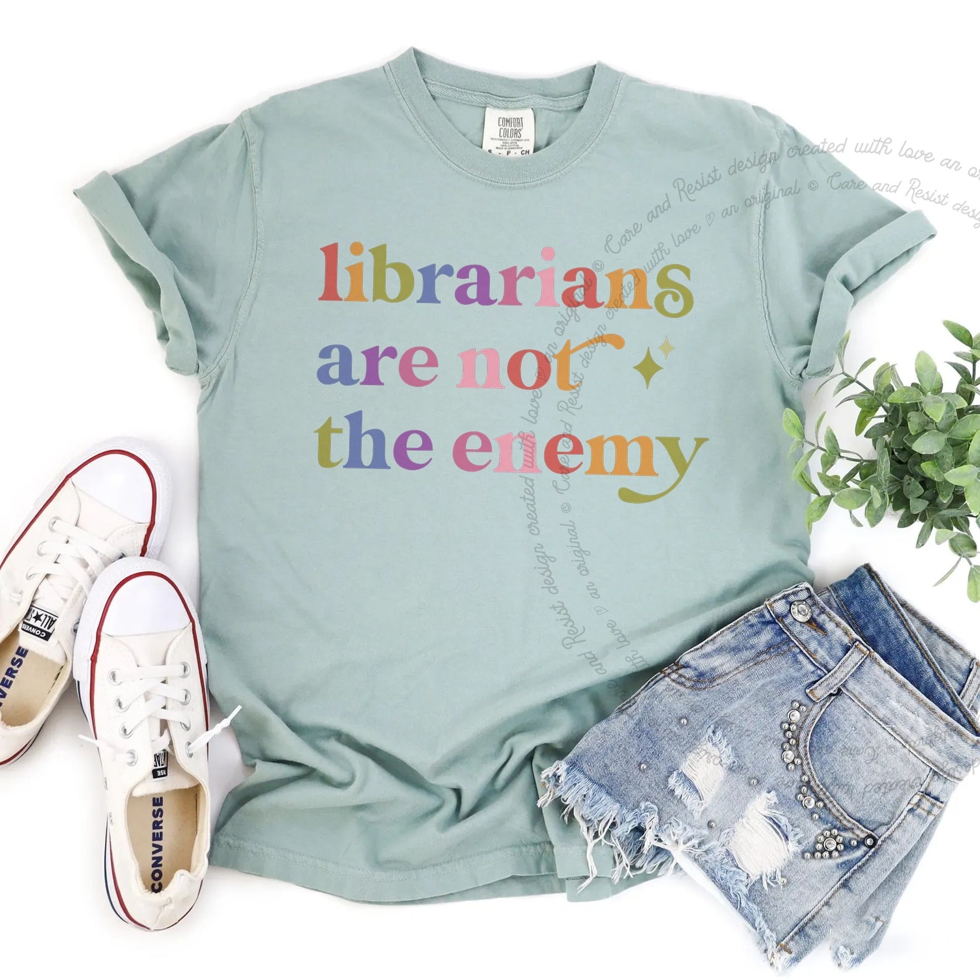 Librarians are not the Enemy Care & Resist rainbow tee