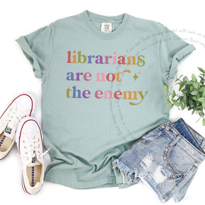 Librarians are not the Enemy Care & Resist rainbow tee