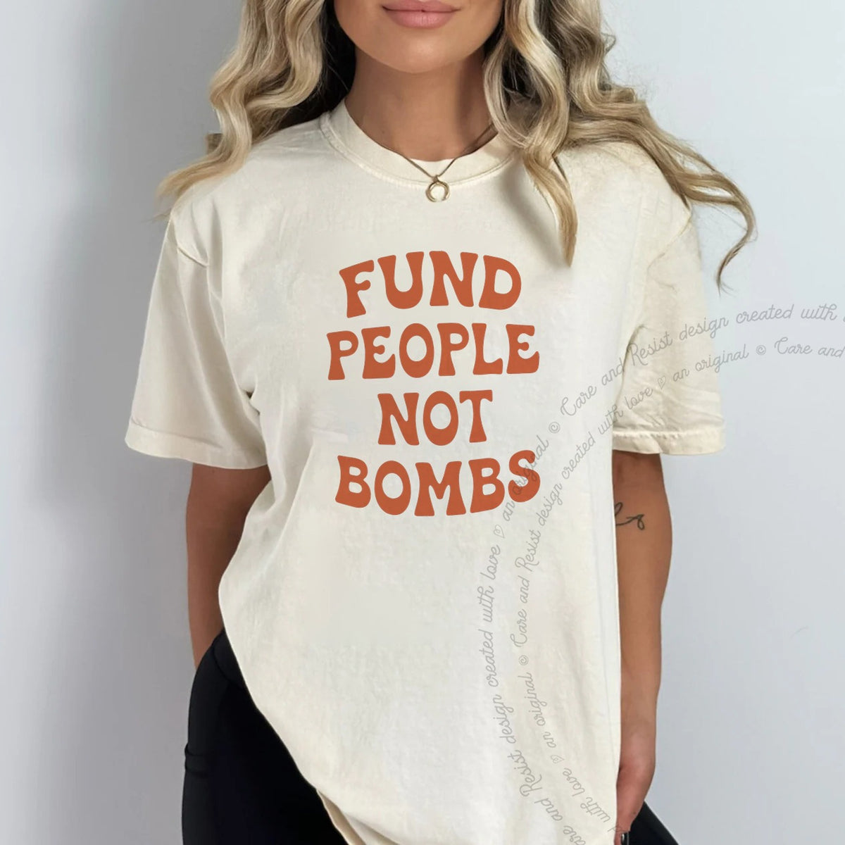 Fund People not Bombs Stacked Care & Resist progressive t-shirt in Ivory