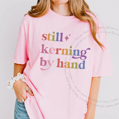Still Kerning By Hand Care & Resist rainbow Comfort Colors tee, Blossom