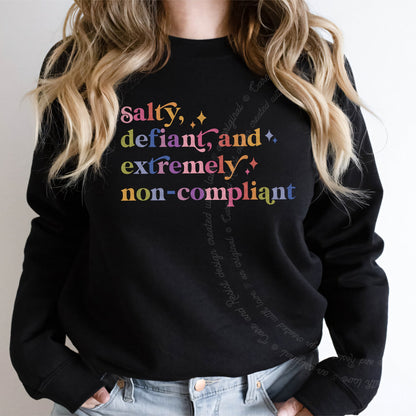 Salty, Defiant, and Extremely Non-compliant Care & Resist Gildan crewneck sweatshirt in Black