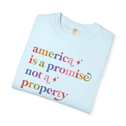 America is a Promise not a Property Care & Resist rainbow Comfort Colors tee
