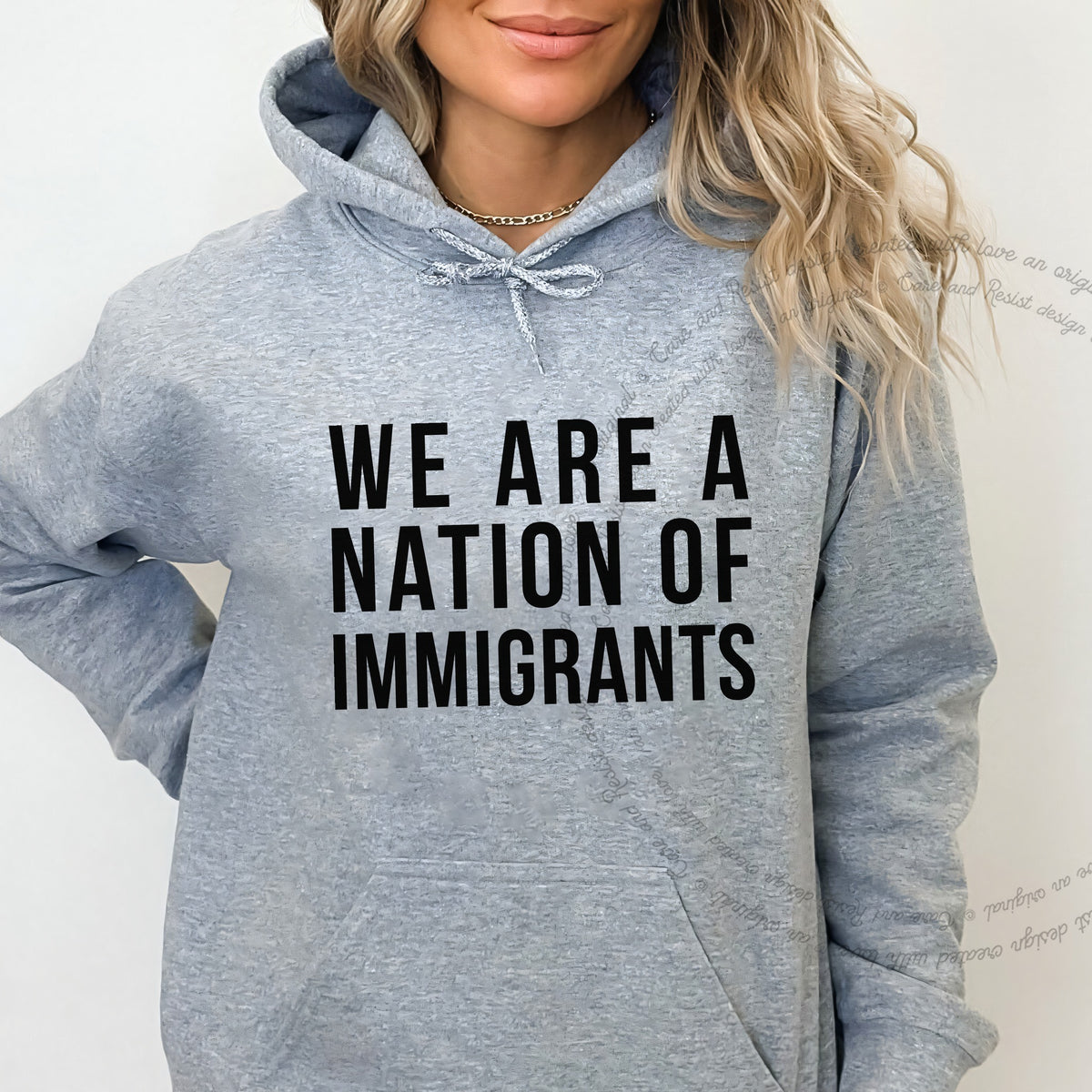 We Are a Nation of Immigrants Care & Resist Gildan hoodie in Sport Grey