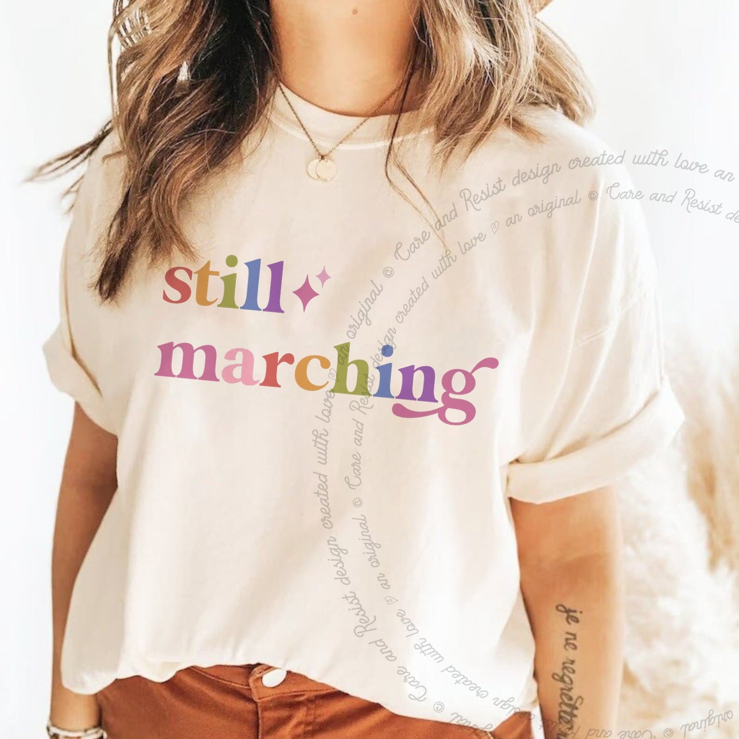 Still Marching Care & Resist rainbow tee