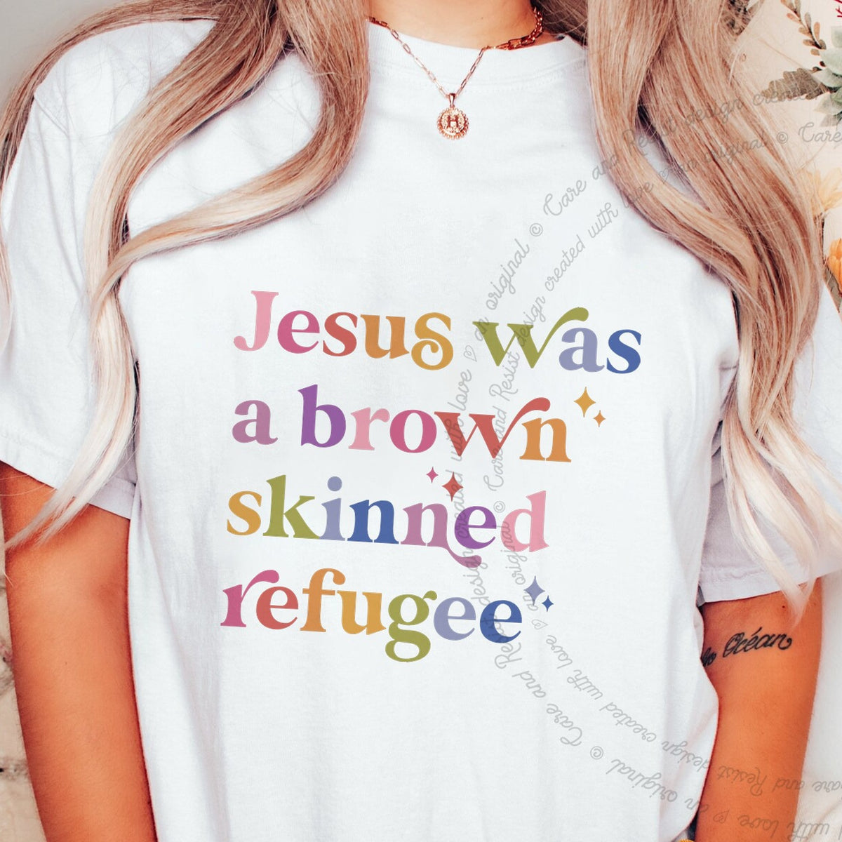 Jesus Was a Brown Skinned Refugee Care & Resist progressive t-shirt in White