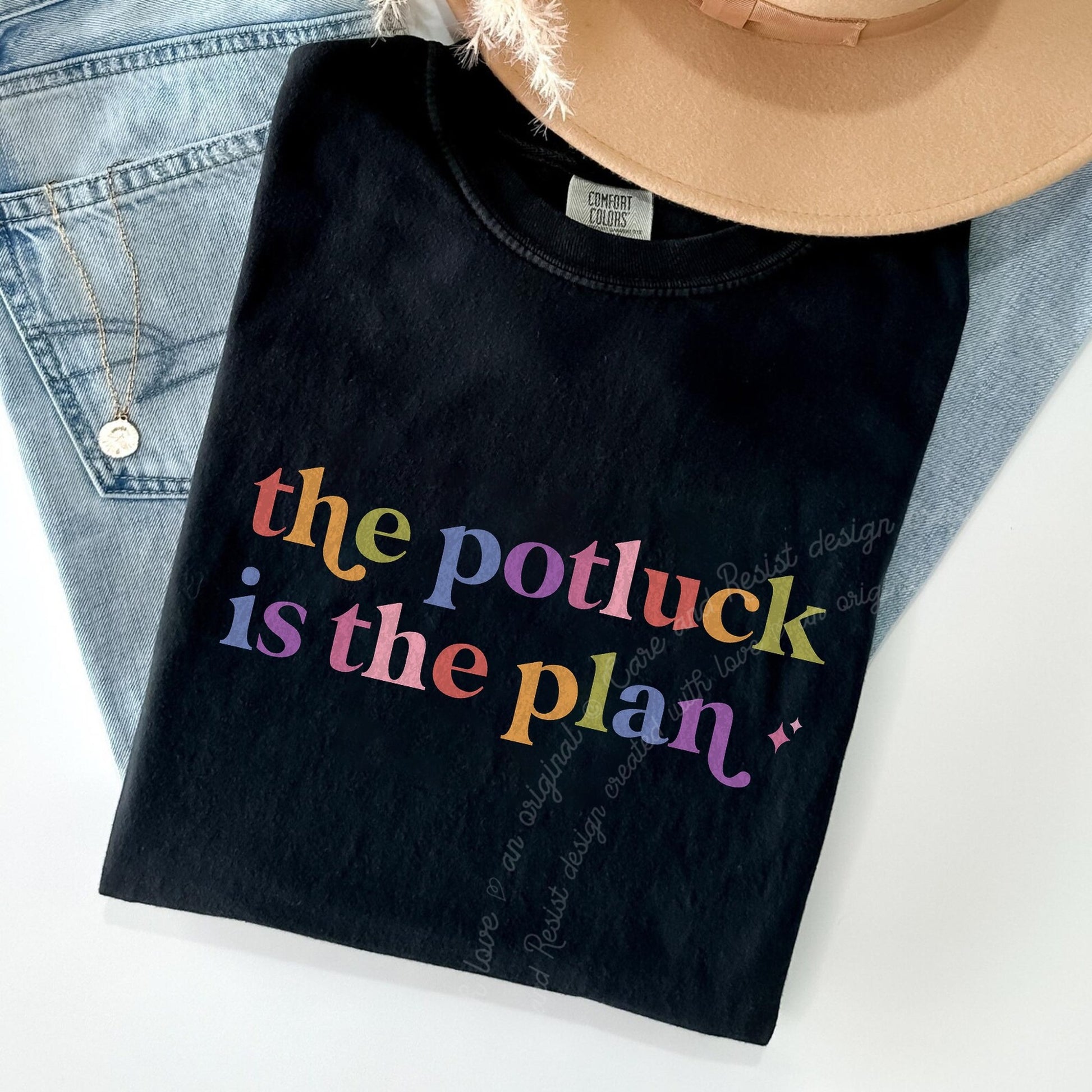 The Potluck is the Plan Care & Resist rainbow tee