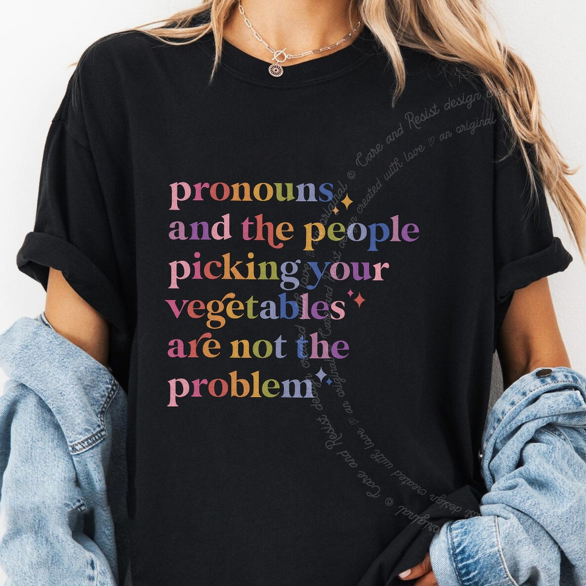 Pronouns and the People Picking Your Vegetables Are Not the Problem Care & Resist progressive t-shirt in Black