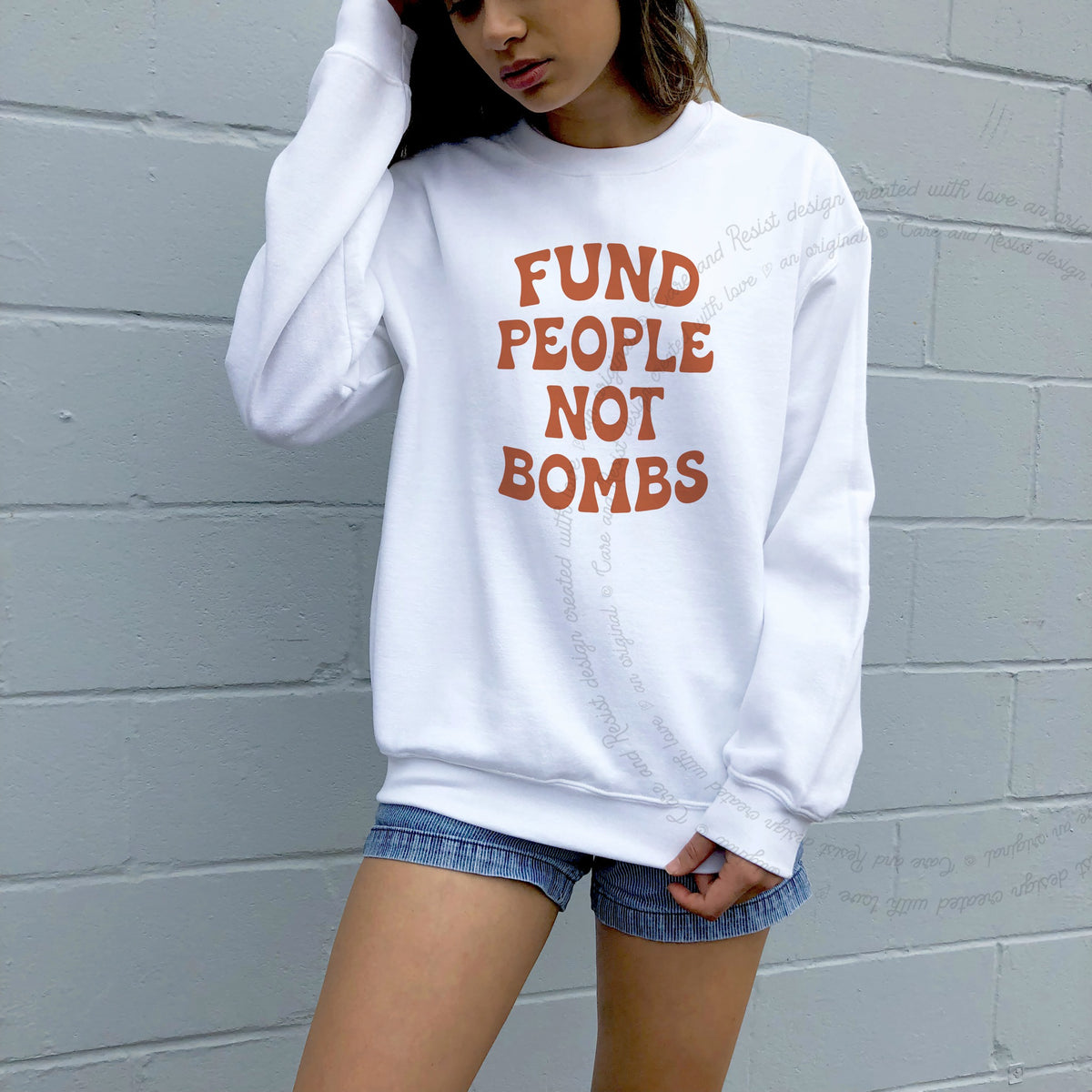 Fund People not Bombs Stacked Care & Resist Gildan crewneck sweatshirt in White
