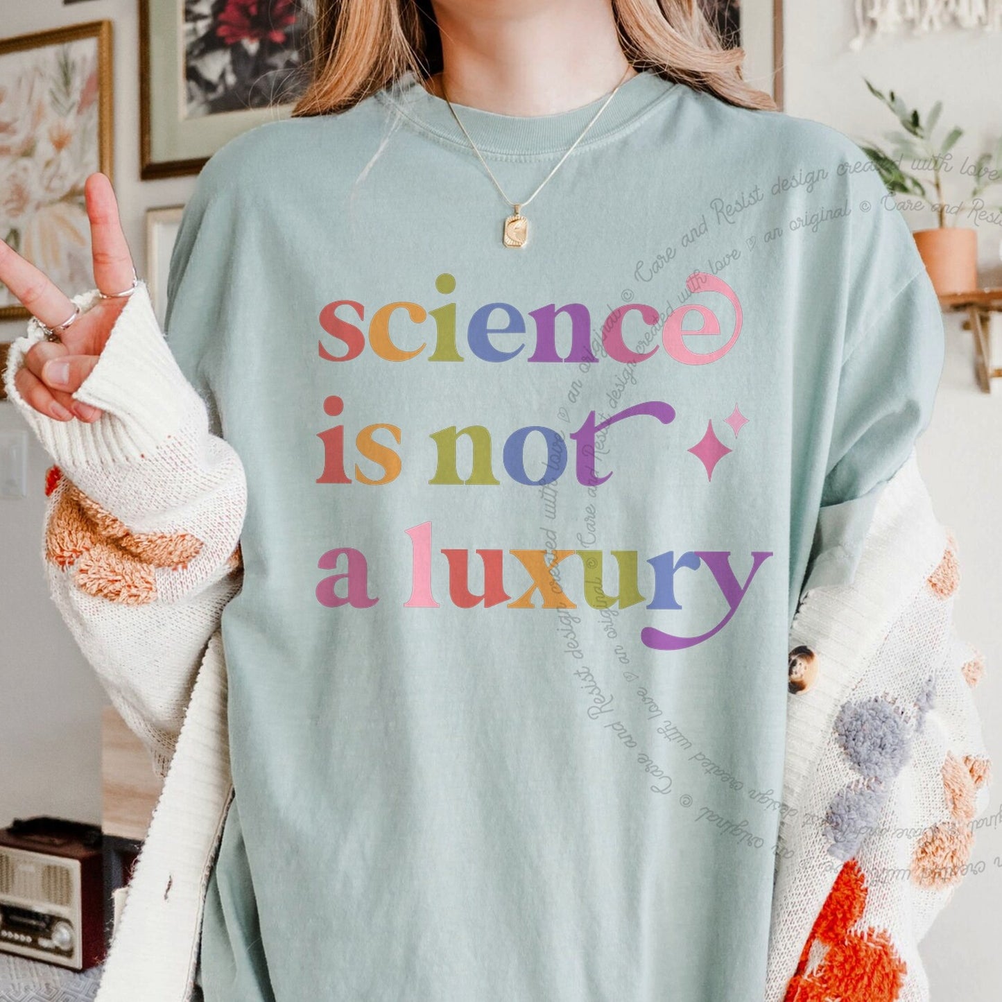 Science is not a Luxury Care & Resist rainbow Comfort Colors tee, Bay