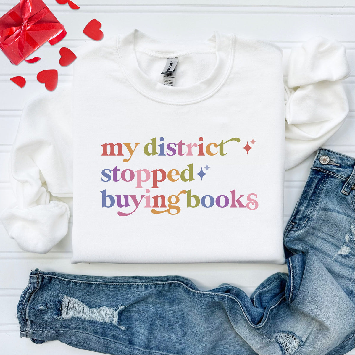 My District Stopped Buying Books Care & Resist Gildan crewneck sweatshirt in White