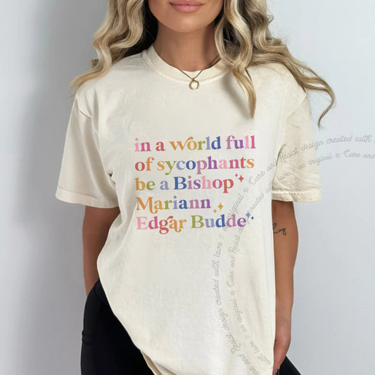 In a World Full of Sycophants Be a Bishop Mariann Edgar Budde Care & Resist progressive t-shirt in Ivory