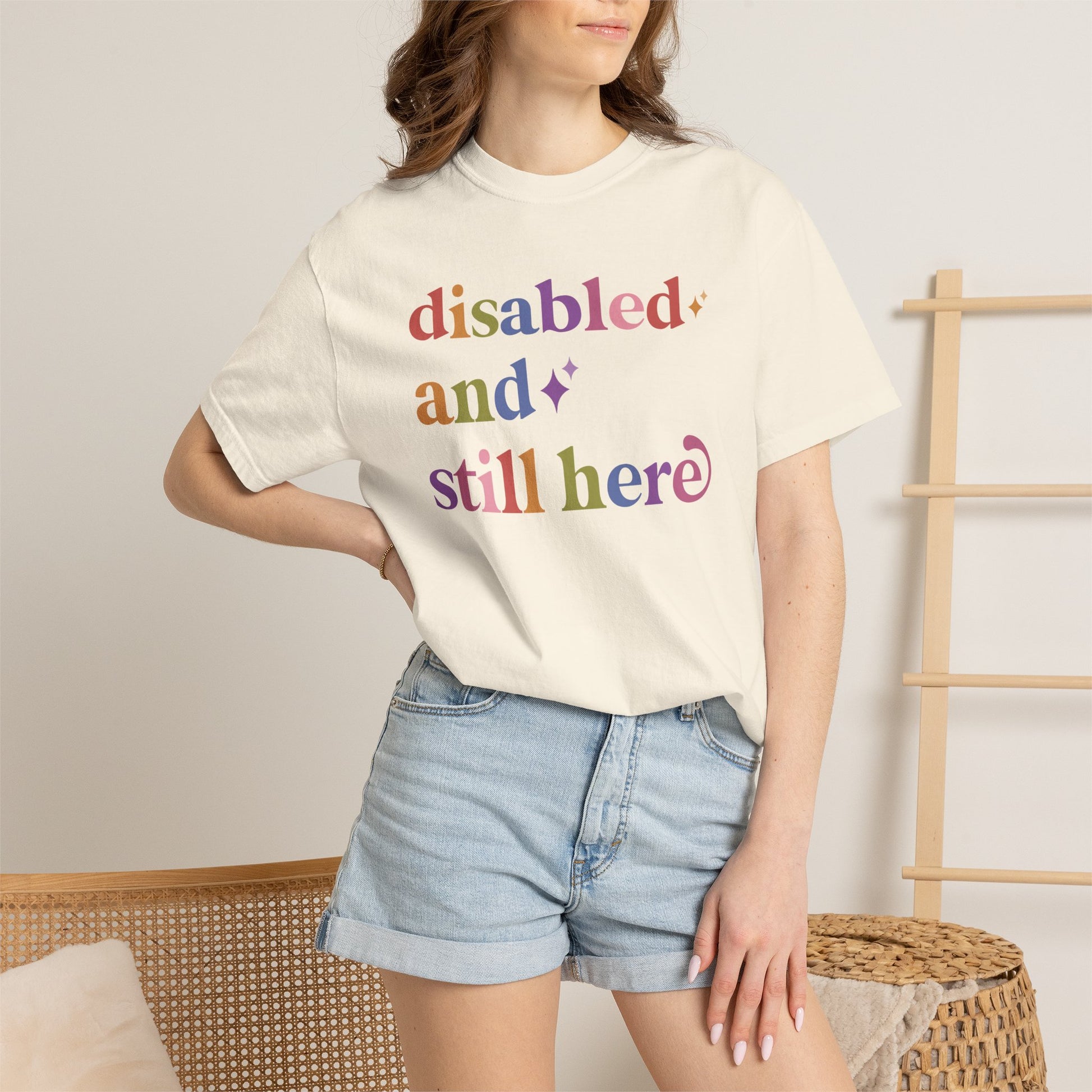 Disabled and Still Here Care & Resist rainbow Comfort Colors tee