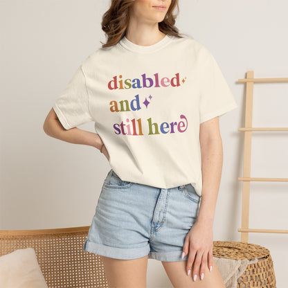 Disabled and Still Here Care & Resist rainbow Comfort Colors tee