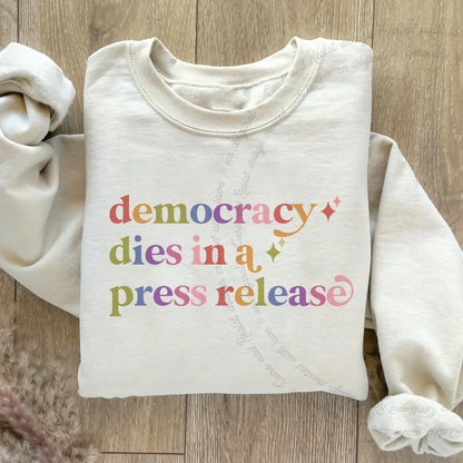 Democracy Dies in a Press Release Care & Resist Gildan crewneck sweatshirt in Sand