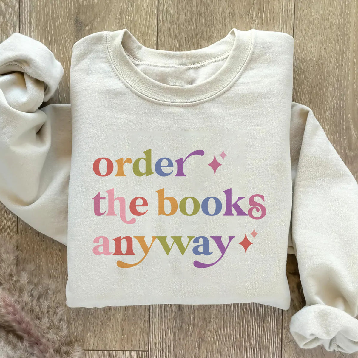 Order the Books Anyway Care & Resist Gildan crewneck sweatshirt in Sand