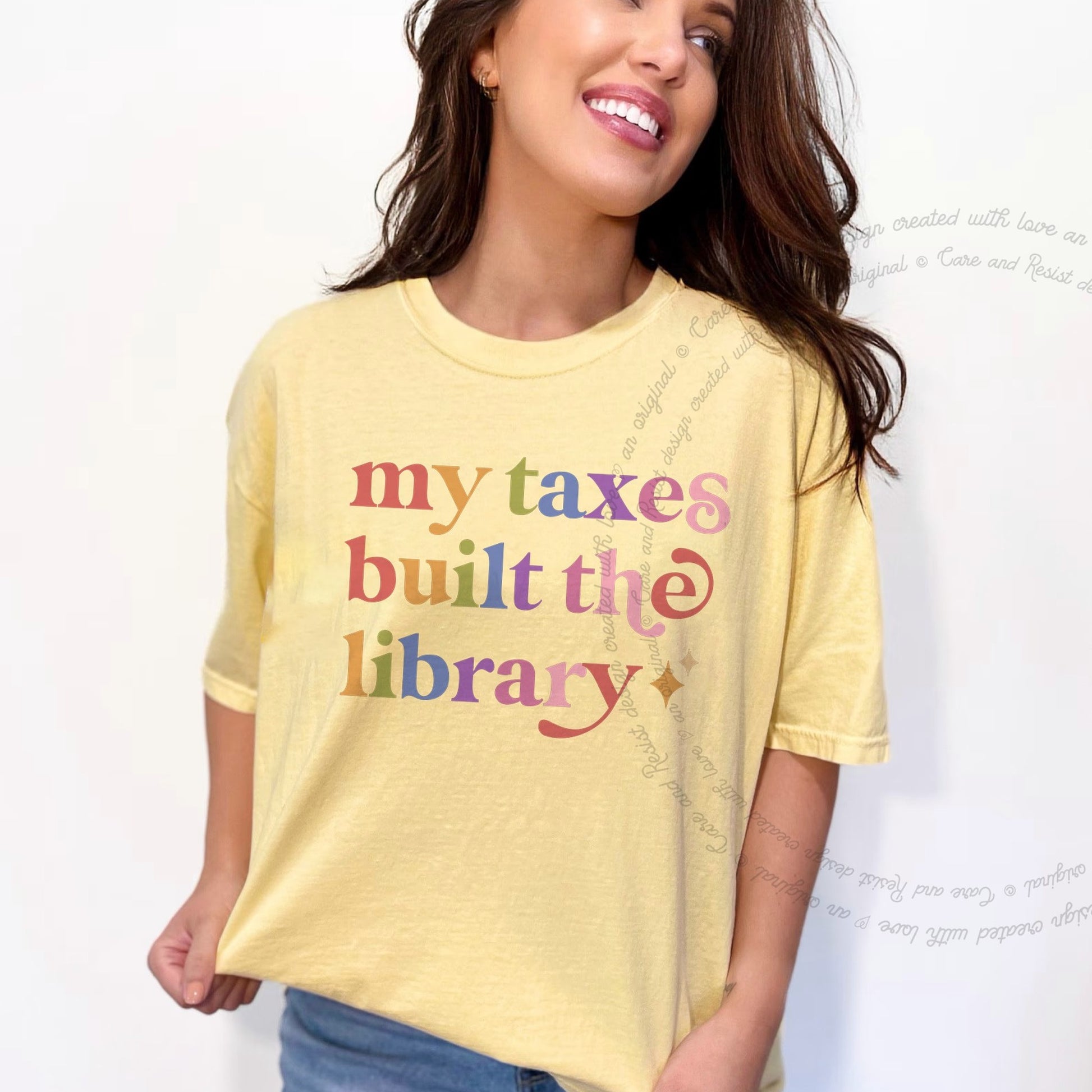 My Taxes Built the Library Care & Resist rainbow tee