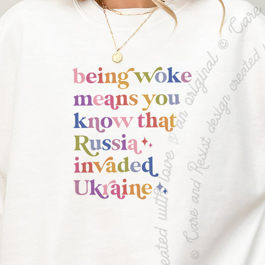 Being Woke Means You Know That Russia Invaded Ukraine Care & Resist Gildan crewneck sweatshirt in White