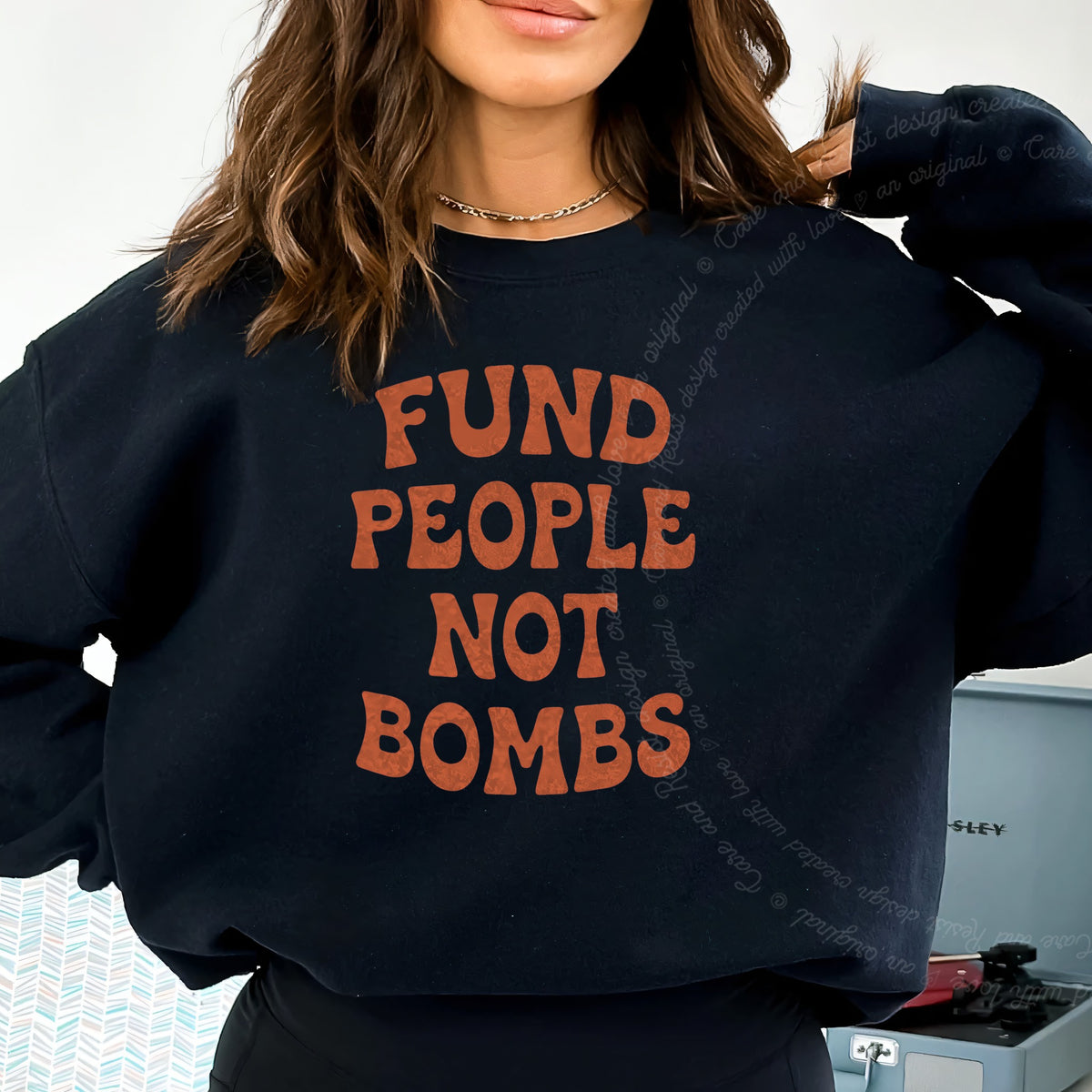 Fund People not Bombs Stacked Care & Resist Gildan crewneck sweatshirt in Black
