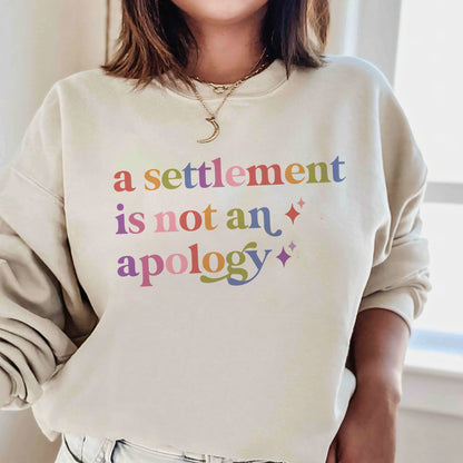 A Settlement is not an Apology Care & Resist Gildan crewneck sweatshirt in Sand